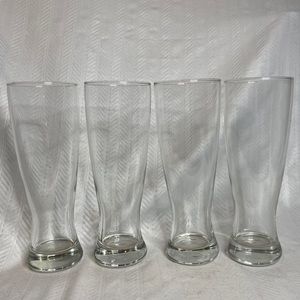 Clear heavy glass pilsner 9” tall beer bar ware.